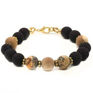 Bracelet with eath brown lava rocks and gold lobster clasp.